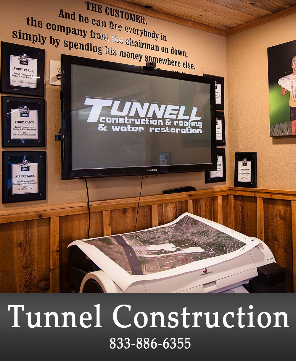 Image of a TV on a Wall Advertising a Construction Business