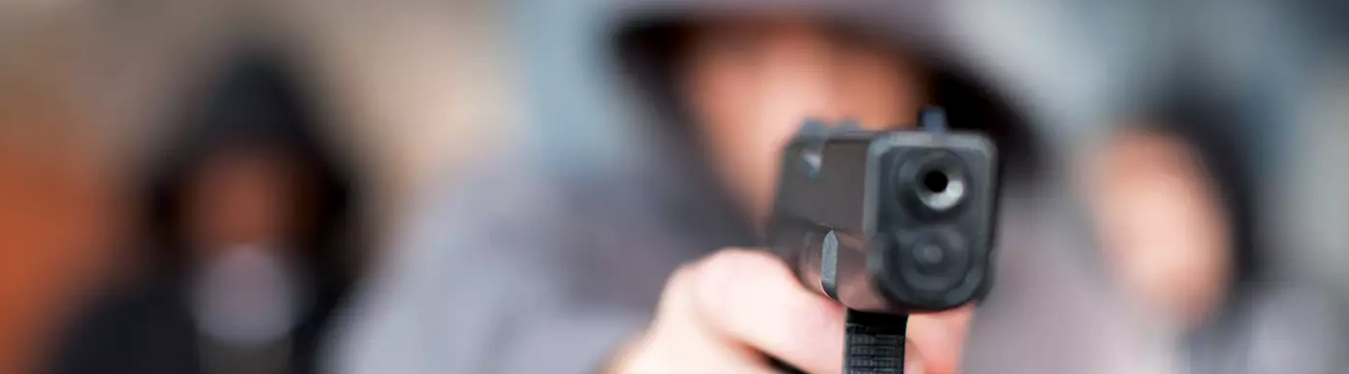 Image of a Group of Blurred Shooters Banner