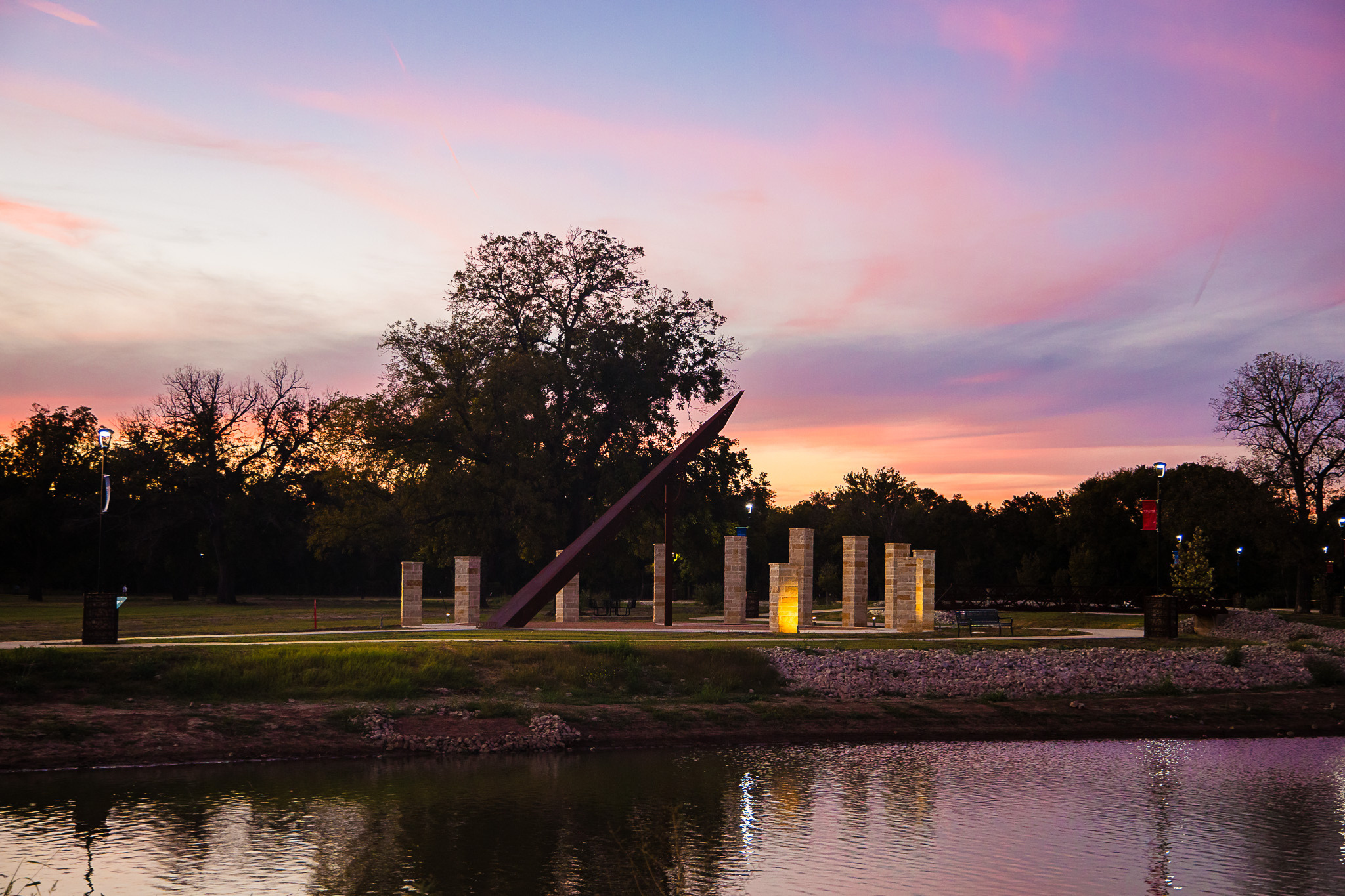 Picture of the sundial by the lake in the sunset